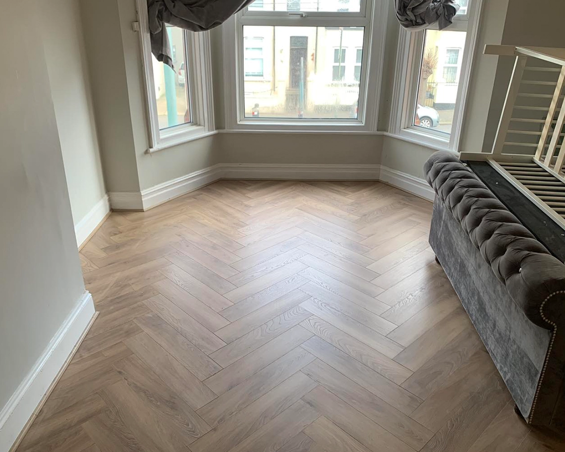 Herringbone parquet floor installed by LJB Carpentry in a Kent home